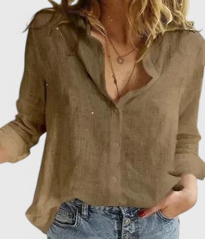  Female in a button-front shirt styled for everyday wear against a plain background.
