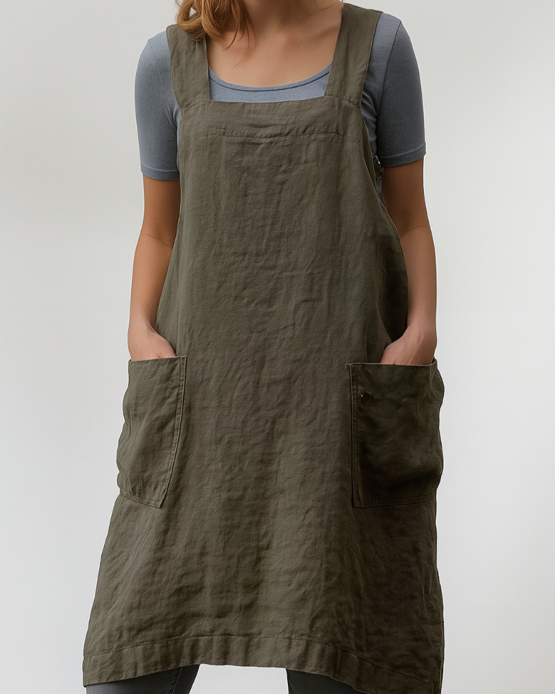 Female wearing a casual midi dress with a square neckline and pocket detail.