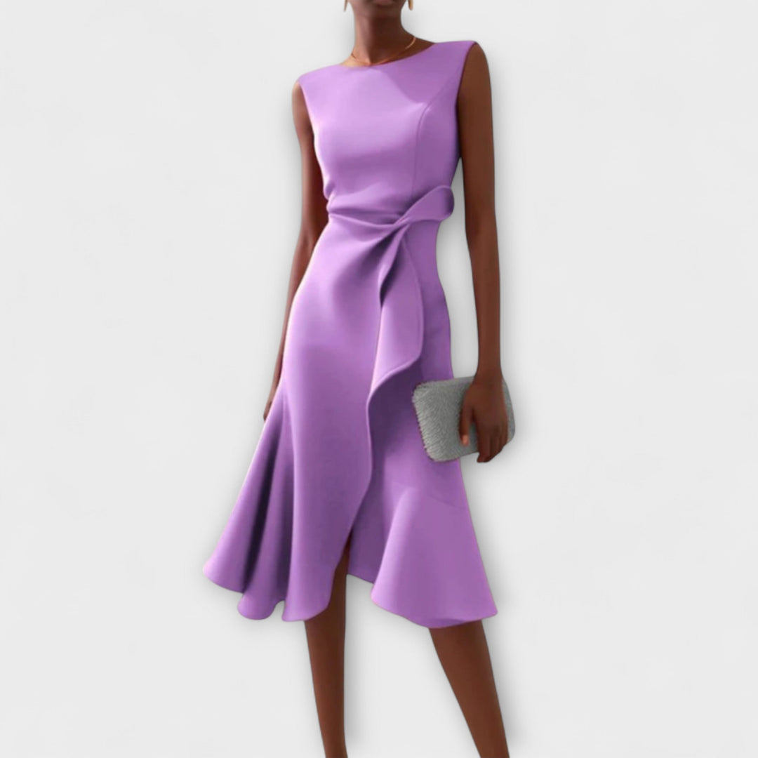 Female posing in a midi dress